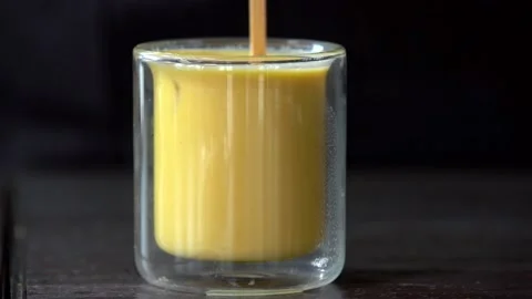 Coffee with milk and ice Stock Footage 232601404