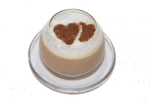 Coffee with milk and a pattern of cinnamon on a white background Coffee wi... Stock Photos