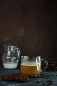 Coffee with the milk in a low key Stock Photos