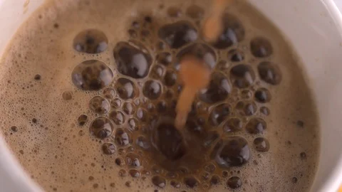 Coffee milk slow motion Stock Footage 123648500