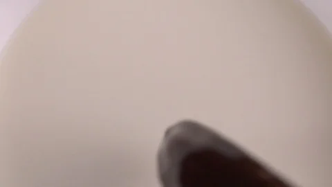 Coffee milk slow motion Stock Footage 123648819