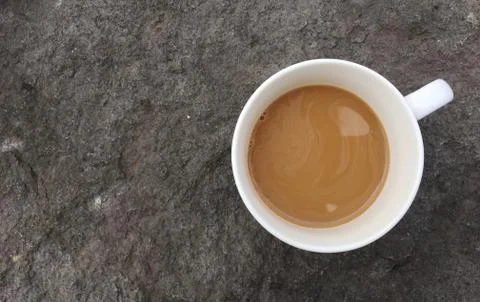 Coffee milk on a stone table Stock Photos