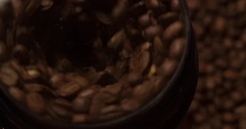 Coffee mill grinder grinds coffee beans close up Slow Motion top view Stock Footage 98245422