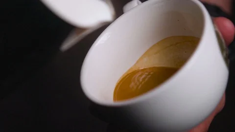 Coffee is mixed with milk Stock Footage 128546736