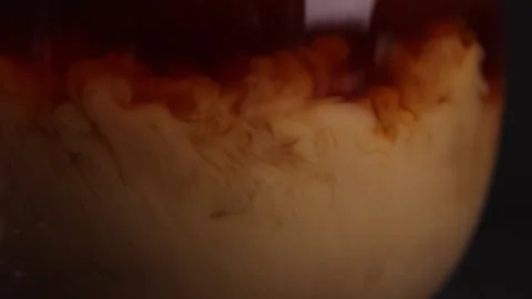 Coffee is mixed with milk Stock Footage 176390017