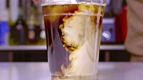 Coffee Mixing With Milk Stock Footage 169804759