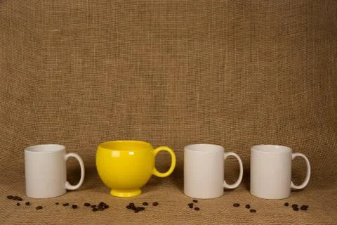Coffee mug background - unique mug and beans Stock Photos