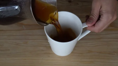 Coffee into the mug Stock Footage