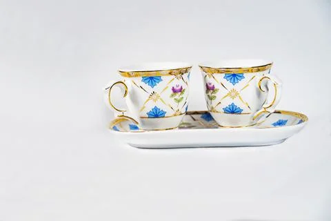 Coffee mug with pattern on white background Stock Photos