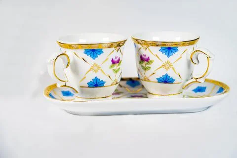 Coffee mug with pattern on white background Stock Photos