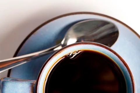 Coffee mug with spoon Stock Photos
