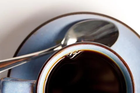 Coffee mug with spoon Stock Photos