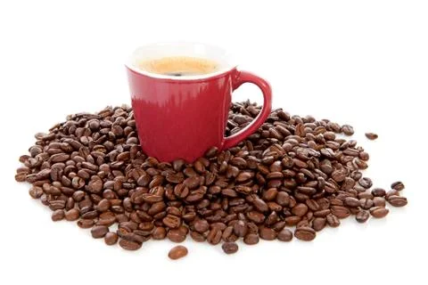 Coffee mug surrounded bij beans Stock Photos