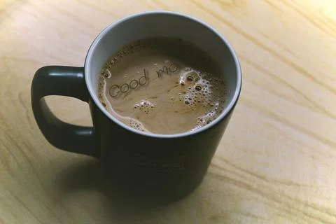 Coffee mug on the table Stock Photos
