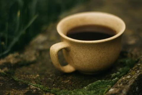 Coffee mug on the table Stock Photos
