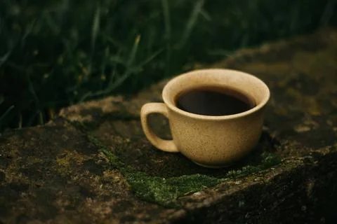Coffee mug on the table Stock Photos