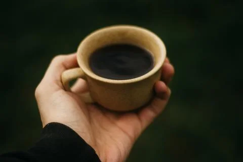 Coffee mug on the table Stock Photos