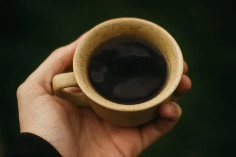 Coffee mug on the table Stock Photos