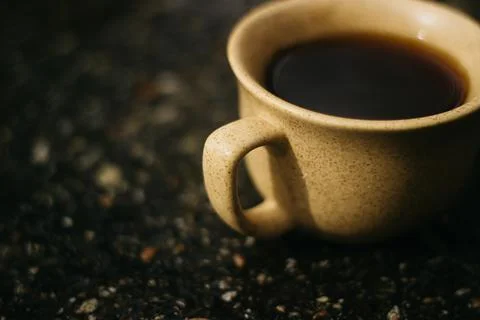 Coffee mug on the table Stock Photos