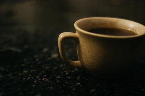 Coffee mug on the table Stock Photos