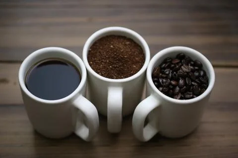 Coffee Mugs of Life - Coffee Beans, Ground Coffee, Brewed Coffee Stock Photos