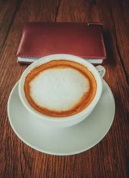 Coffee with notebook Stock Photos