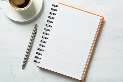Coffee with notepad and pen Stock Photos