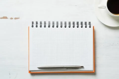 Coffee with notepad and pen Stock Photos