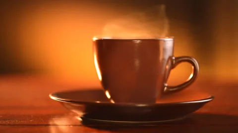 Coffee or Tea. Brown Cup of Hot Beverage with Steam Stock Footage 33913526