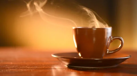 Coffee or Tea. Brown Cup of Hot Beverage with Steam Stock-Footage 33913599