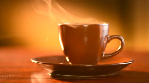 Coffee or Tea. Brown Cup of Hot Beverage with Steam Stock Footage 33962329