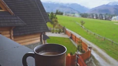 Coffee or Tea. Brown Rustic Cup of hot beverage with Steam Outdoors. 4K. Stock Footage 66755437