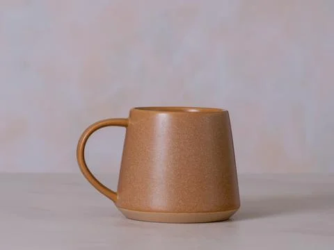 Coffee or tea mug with handle, front view photo Stock Photos
