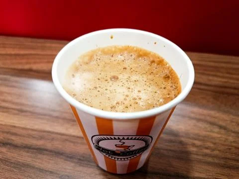 A coffee in a paper cup Stock Photos