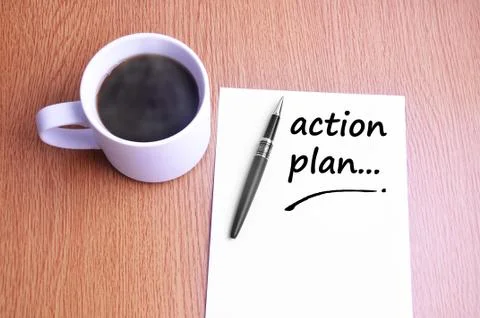 Coffee, pen and notes write action plan Stock Photos