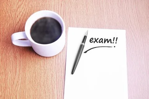 Coffee, pen and notes write exam Stock Photos