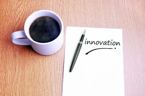 Coffee, pen and notes write innovation Stock Photos