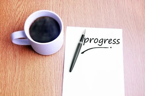 Coffee, pen and notes write progress Foto stock