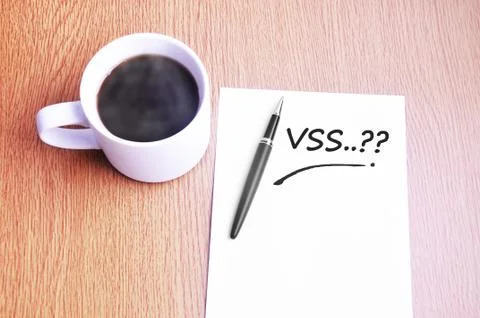 Coffee, pen and notes write vss Stock Photos