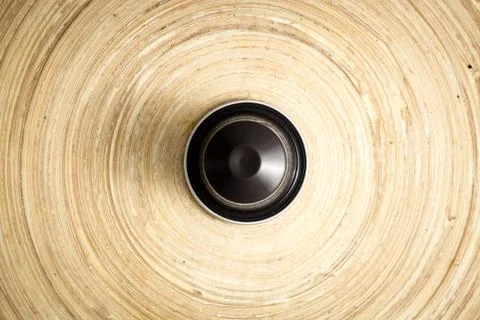 Coffee pod on bamboo surface, hero shot, soft light, focused lighting Stock Photos