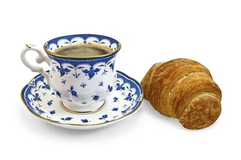 Coffee in a porcelain cup with a blue pattern and croissant isolated on a white Stock Photos