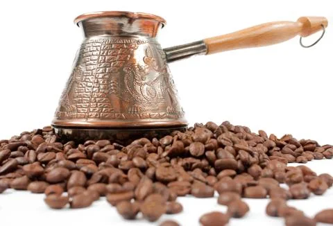 Coffee pot on beans Stock Photos