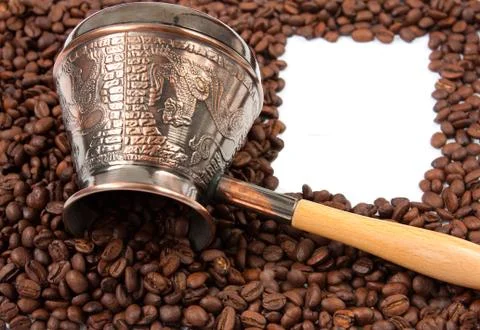 Coffee pot on beans Stock Photos