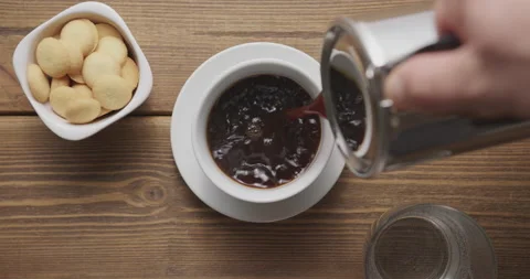 Coffee pour into cup from geyser coffee maker Stock-Footage 146945967