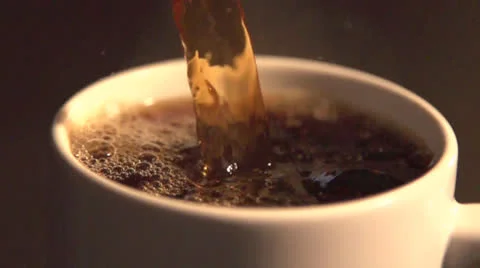 Coffee pour super slow motion  Vídeos de archivo 25448790