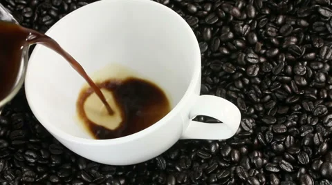Coffee Poured Into Cup Bean Background Stock Footage