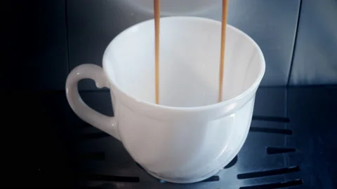 Coffee poured into a cup of coffee machine Stock-Footage 102716205