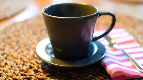 Coffee is poured into the cup. Stock Footage 104808536