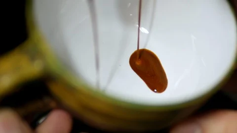 Coffee is poured into a mug. coffee machine. making coffee, close up Stock Footage 129173171