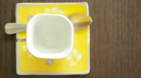 Coffee is poured into the mug. view from above. hot drink Stock Footage
